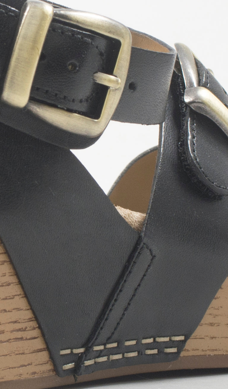DANSKO Zeppa donna nera in pelle