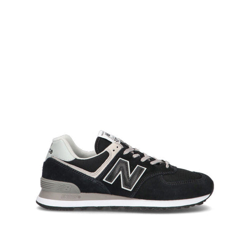 NEW BALANCE 574 Sneaker uomo nera in suede