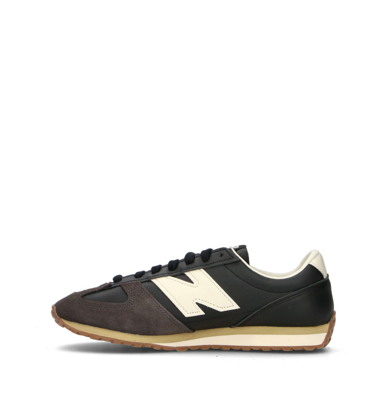 NEW BALANCE Sneaker uomo nera in pelle